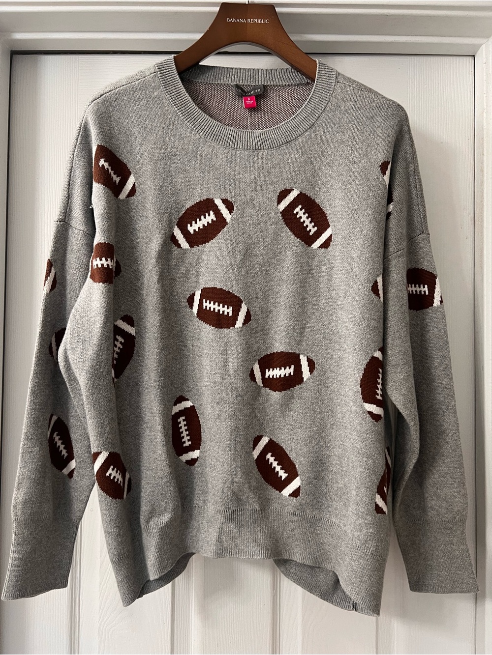 Vince Camuto Gray Crewneck Sweater with Brown & White Footballs
Fall/ Football